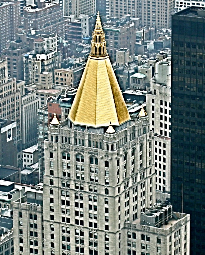 new york city empire state building view gold topped building
