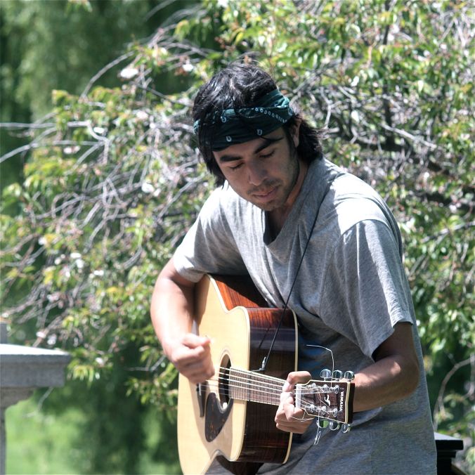 boston common guitar player