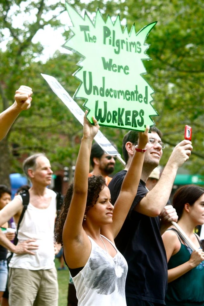 boston copley square immigration protest july 10 2010 woman holding sign the pilgrms were undocumented workers