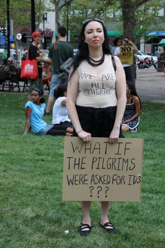 boston copley square immigration protest july 10 2010 woman holding sign