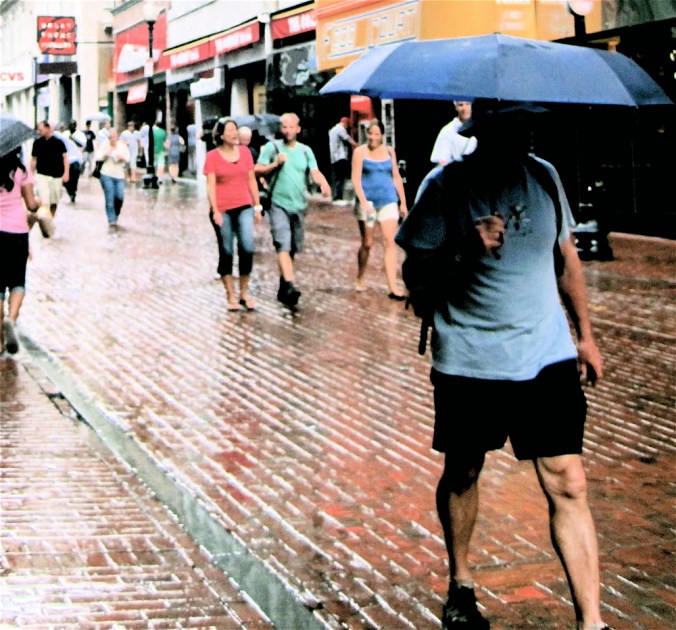 boston downtown crossing man with umbrella