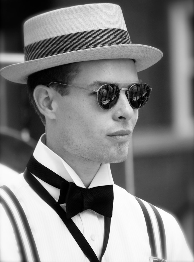 new york city governors island jazz age party guy in hat glasses