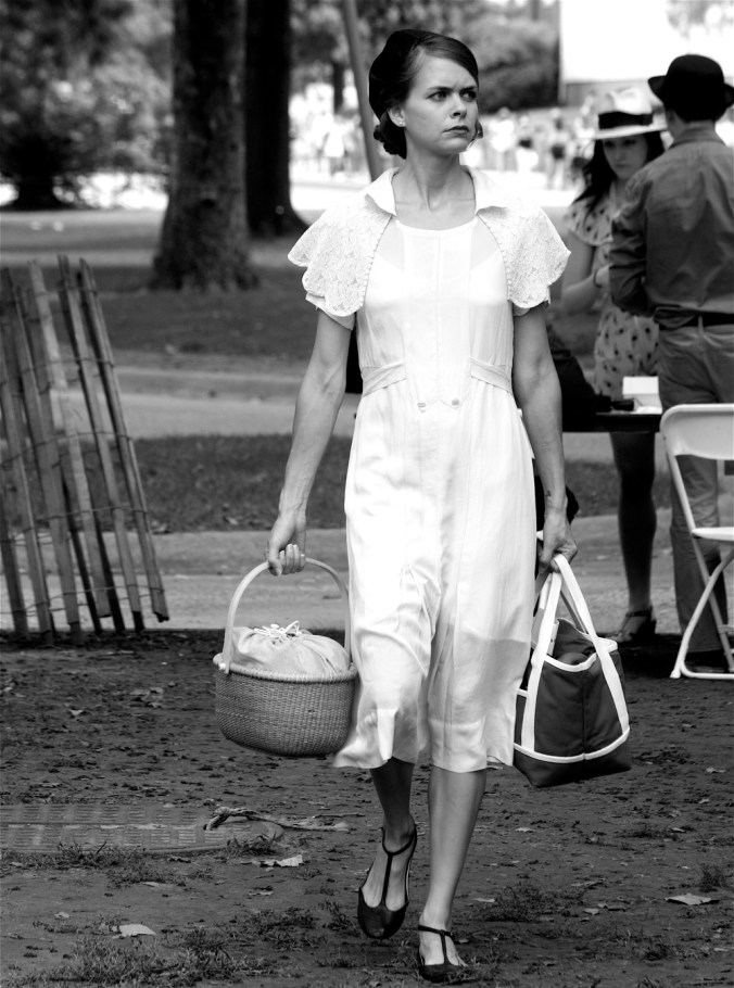 new york city governors island jazz age party woman white dress black and white photo