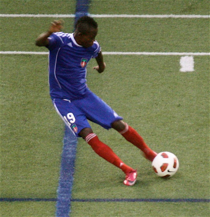 boston harvard university stadium haiti leve haitan player kicking ball