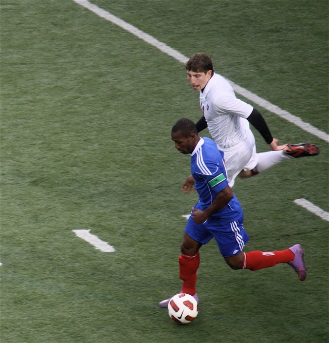 boston harvard university stadium haiti leve two players 4