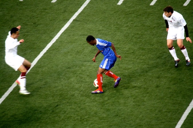 boston harvard university stadium haiti leve wide shot