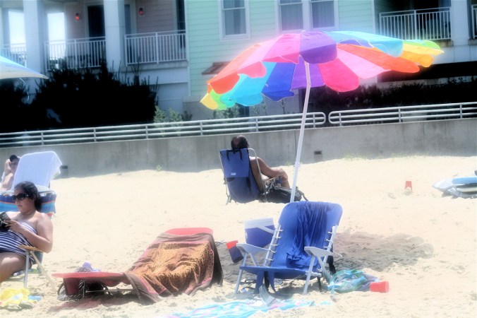 virginia beach sand bridge memorial day beach view rainbow umbrella