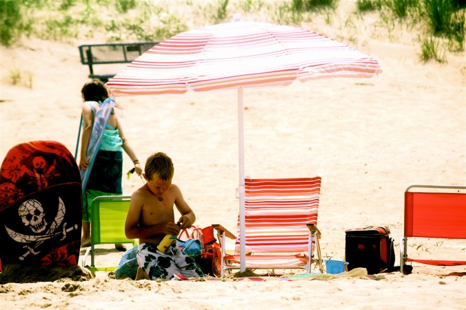 virginia beach sand bridge memorial day beach view red umbrella