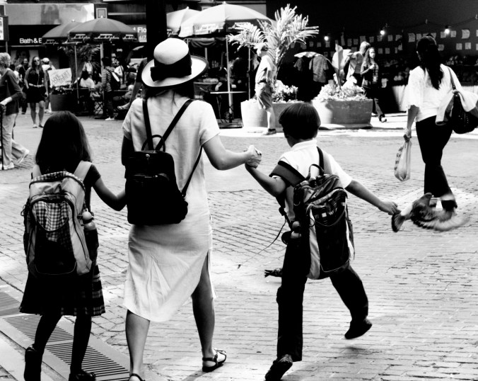 boston downtown crossing family woman in hat