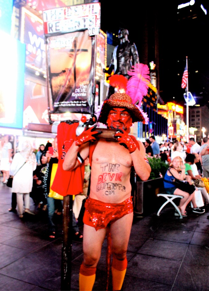 new york city times square man in devil costume