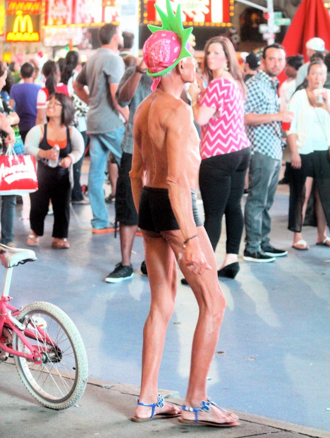 new york city times square man in underwear from back