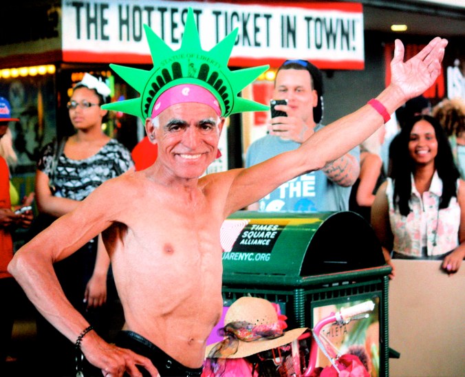 new york city times square man in underwear with hand up