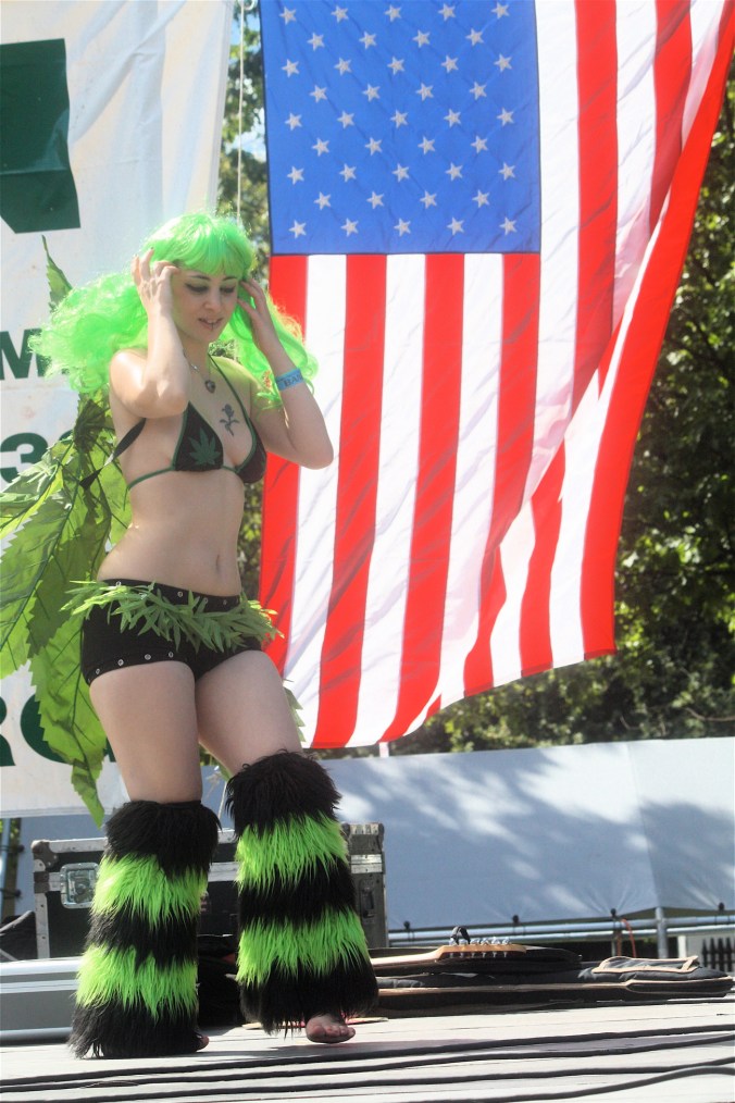 boston boston common hemp fest september 15 2012 woman dancing American flag in the background 2