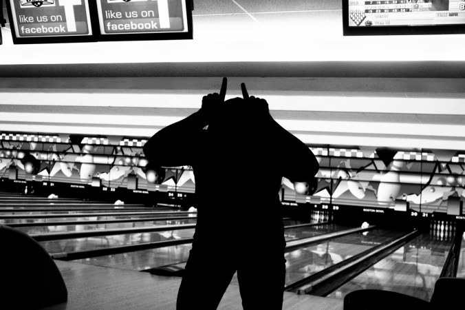 boston dorchester boston bowl person making faces in the alley