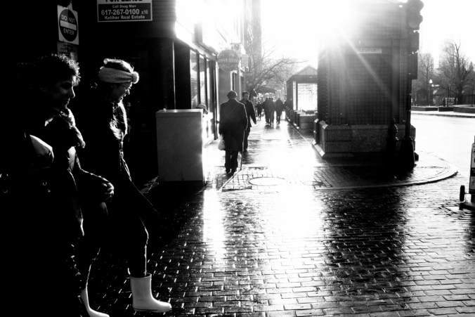 boston winter street light rain people walking