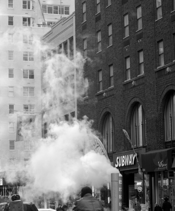 new york city midtown steam on street