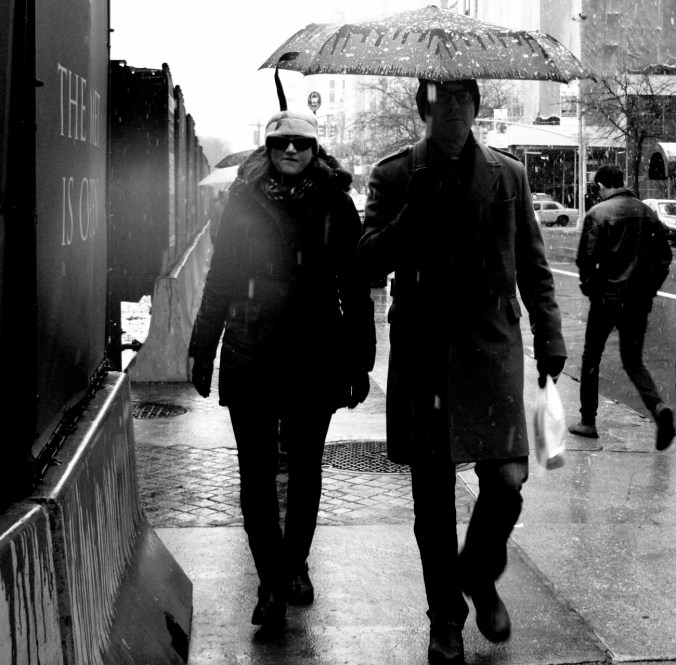 new york city snow storm december 29 2012 people with umbrellas