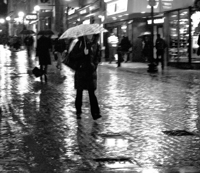 boston downtown crossing people with umbrellas rain