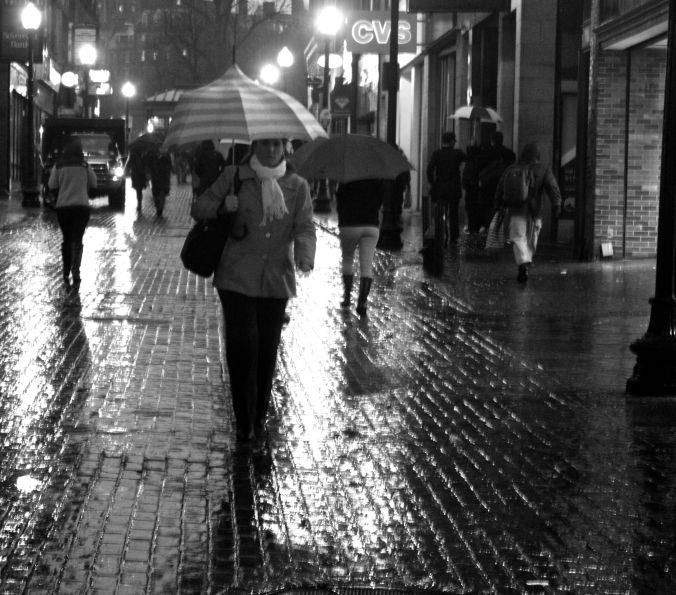 boston downtown crossing umbrella people black white