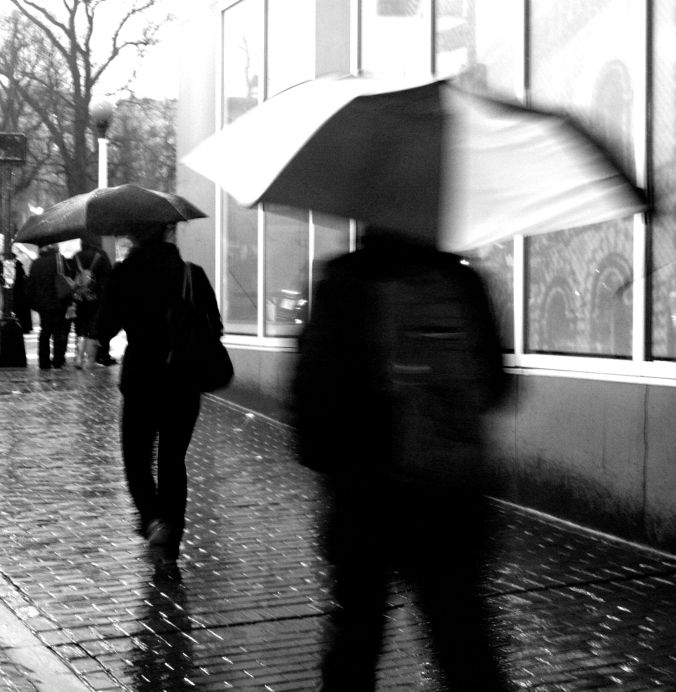 boston downtown crossing umbrellas speeding by