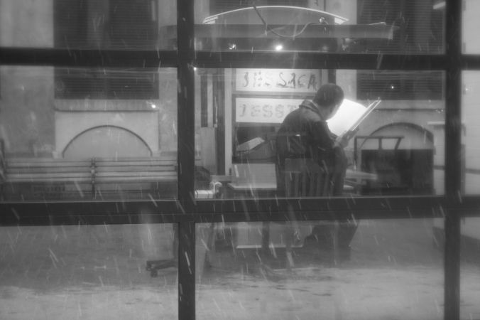 boston snow storm february 8 blizzard nemo man reading book