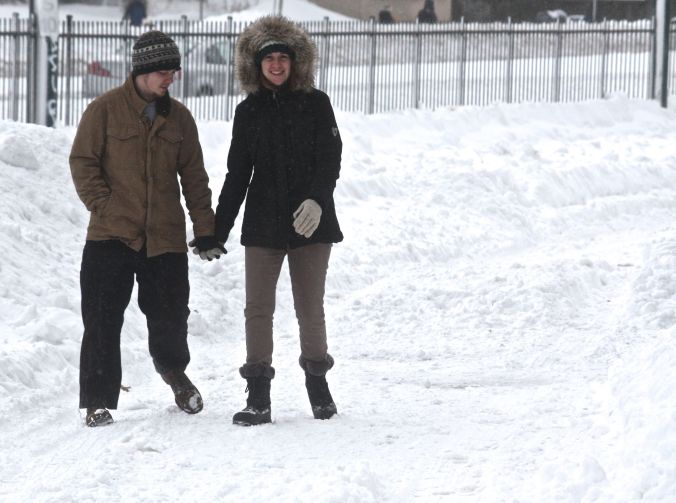 boston snow storm february 9 blizzard nemo couple walking in snow