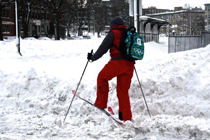 boston snow storm february 9 blizzard nemo person on green line on skis 4