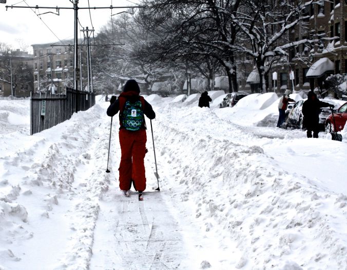 boston snow storm february 9 blizzard nemo person on skis on green line track 2