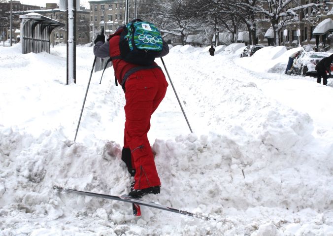 boston snow storm february 9 blizzard nemo person on skis on green line tracks