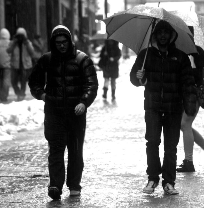 boston downtown crossing people in the rain 3