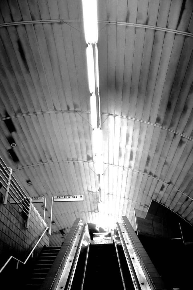 boston porter square t stop escalator black white