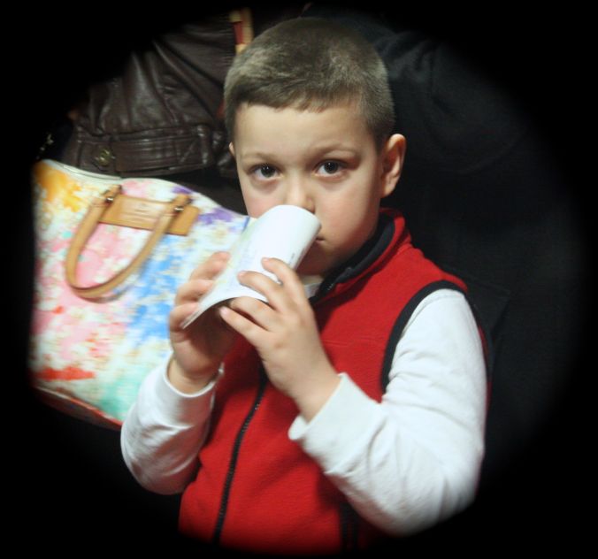 boston sam adams brewery boy with brochure