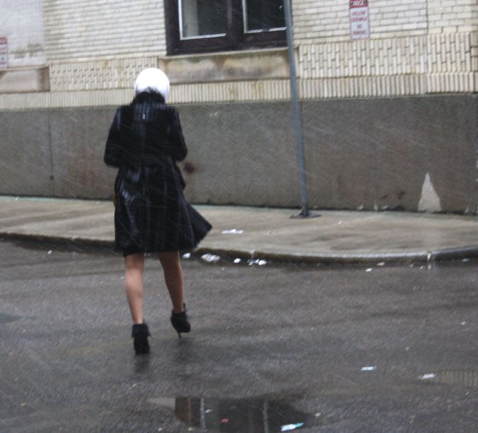 boston snow storm saturn woman walking in storm
