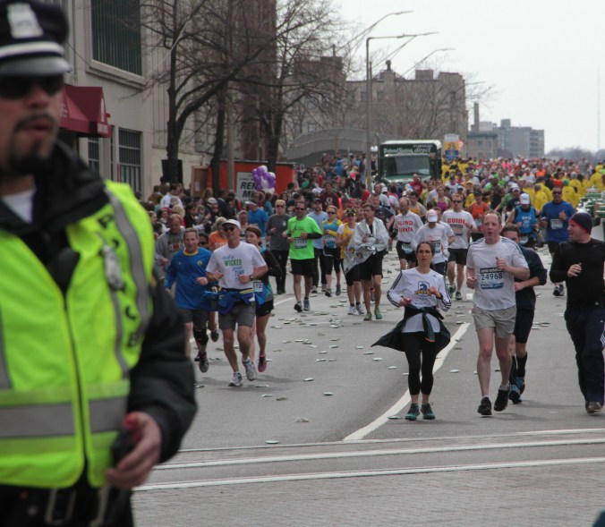 boston marathon 2013 police officer on beacon street runners