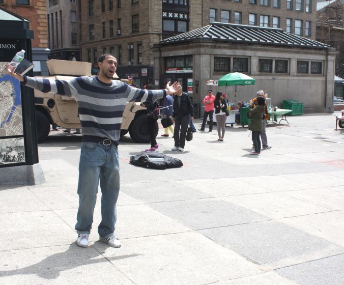 boston park street station man preaching in front of humvee