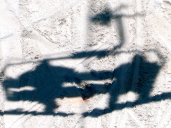 wachusett ski lift skiers shadows