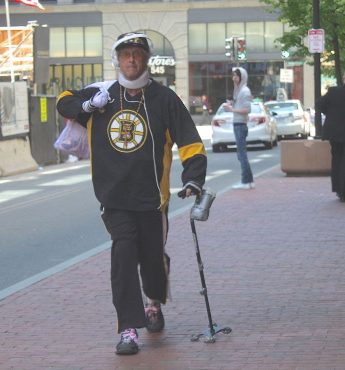 boston downtown crossing man in bruins shirt