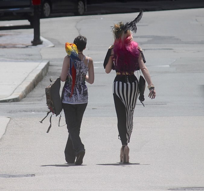 boston faneuil hall woman with bird on shoulder woman in striped dress