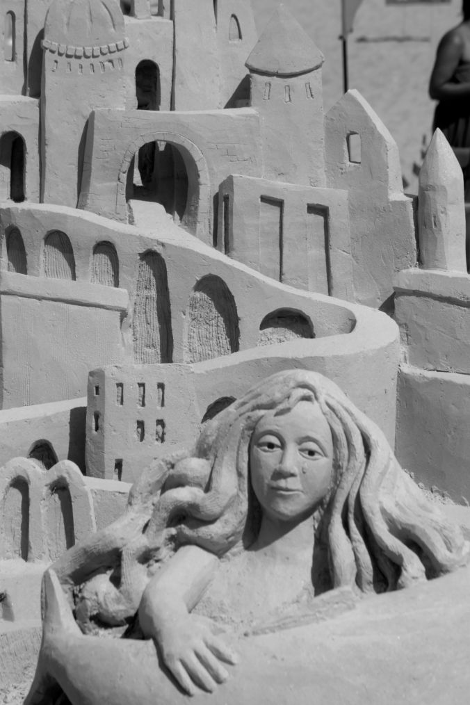 boston revere beach National Sand Sculpting Festival curving castle woman