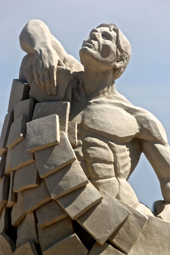 boston revere beach National Sand Sculpting Festival sculpture man looking upward