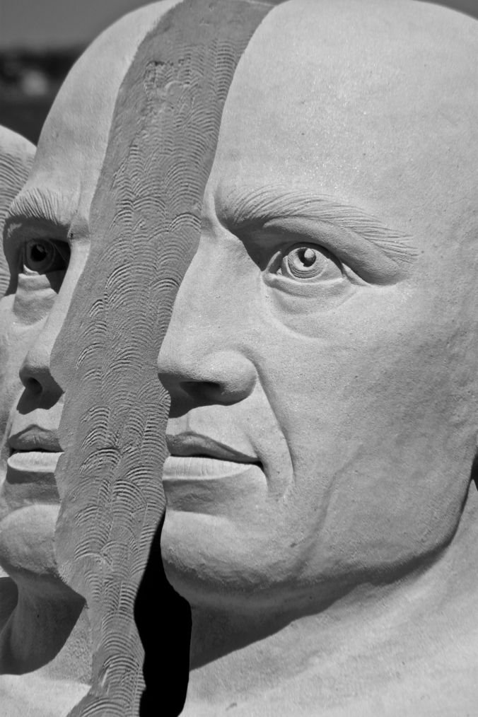 boston revere beach National Sand Sculpting Festival split face sand sculpture black white