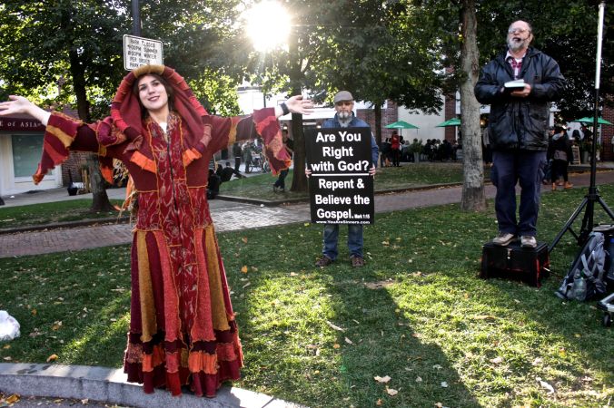 salem halloween 2013 protesters woman in costume 2