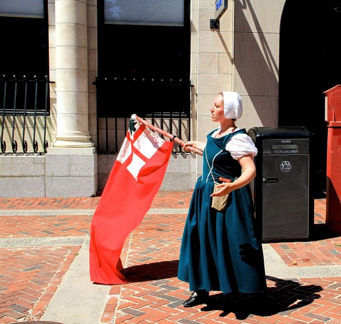 salem witch reenactment flag waver shadow