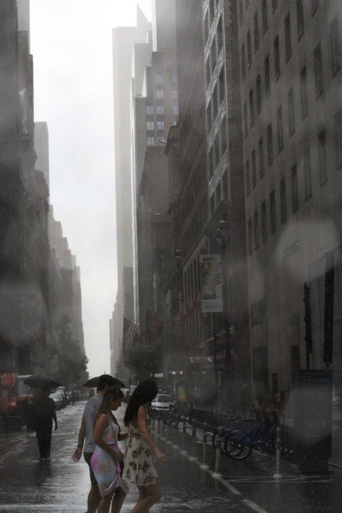 new york city fifth avenue rain drops people