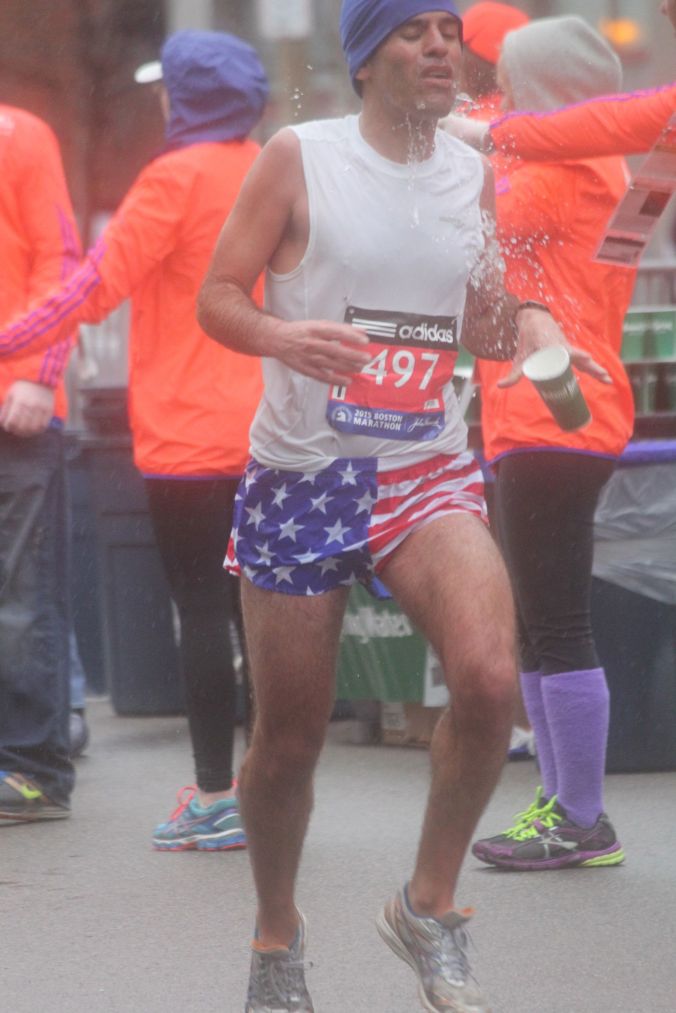 boston marathon april 20 2015 racer number 497 dropping water