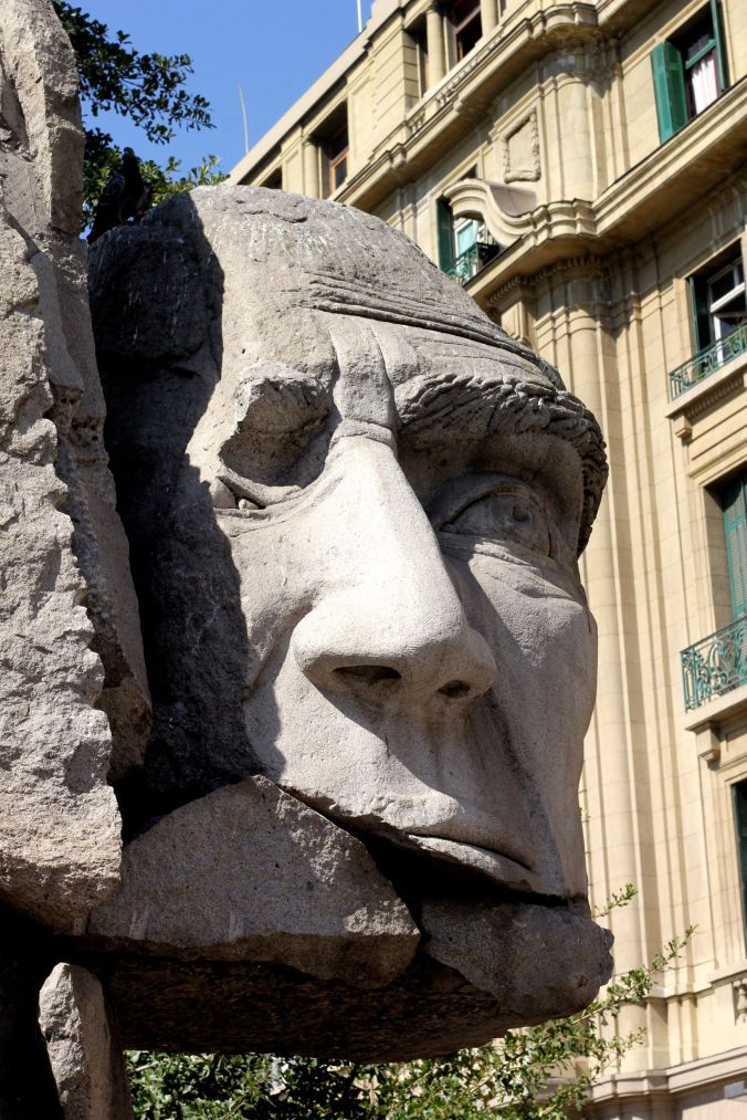 chile santiago plaza de armas statue face