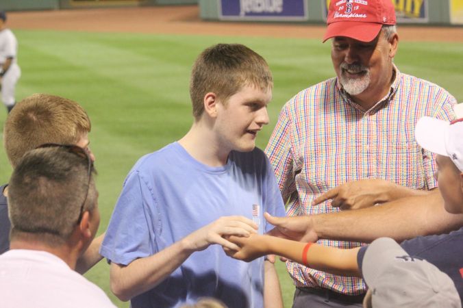 boston fenway park red sox new york yankee boston red sox game july 11 2015 man hearing game ball 4