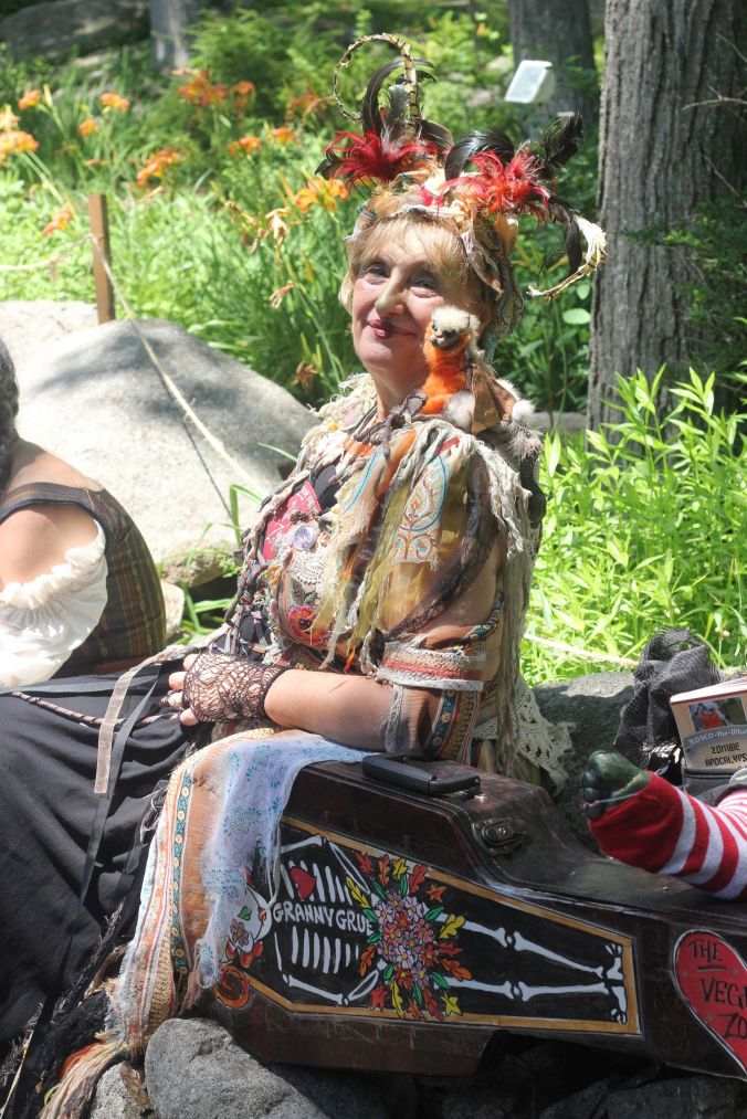 gloucester hammond castle renaissance fair woman in feather outfit