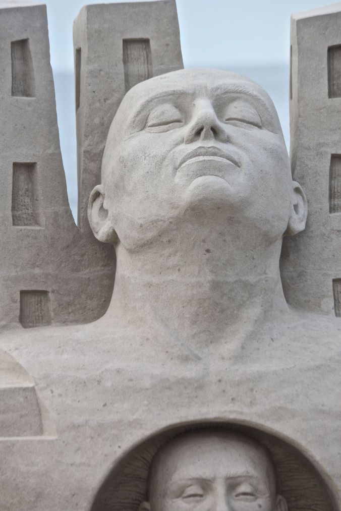 boston revere beach sand sculpture festival heads sculpture head