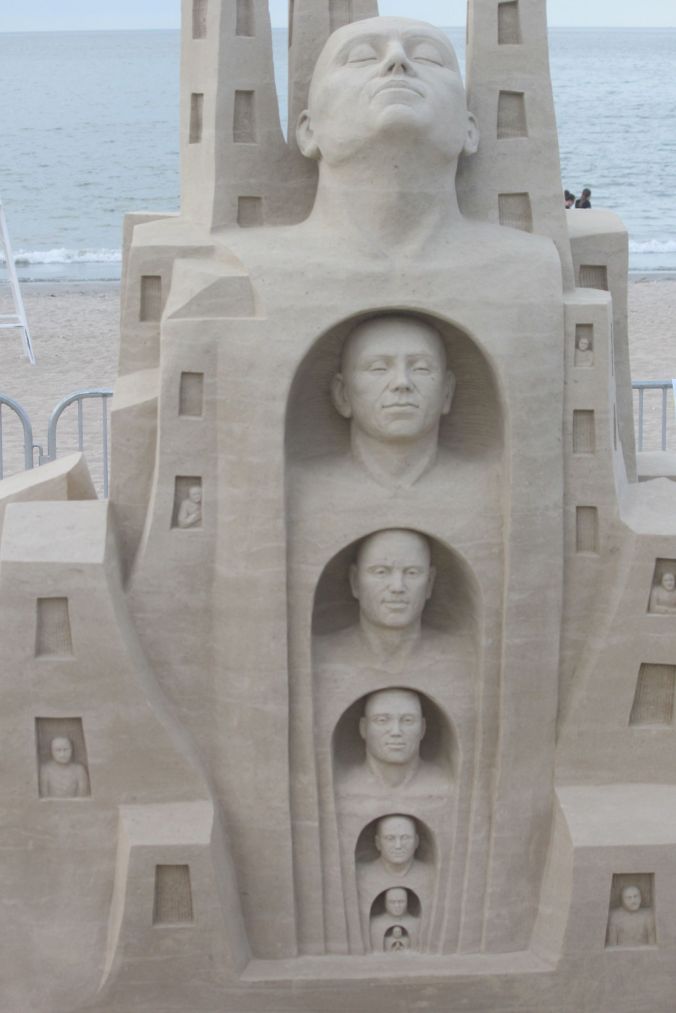 boston revere beach sand sculpture festival heads sculpture